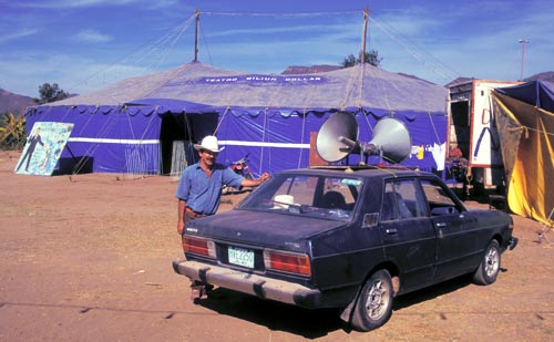 A traveling hypnotist sets up his blue tent in Alamos, Sonora, Mexico.  Photo by Anders Tomlinson.
