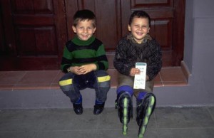 @ boys at night, one with new skates, Alamos, Sonora, Mexico. Photo by Anders Tomlinson.